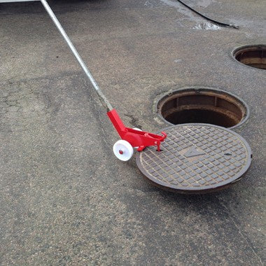Manhole cover opener with wheels